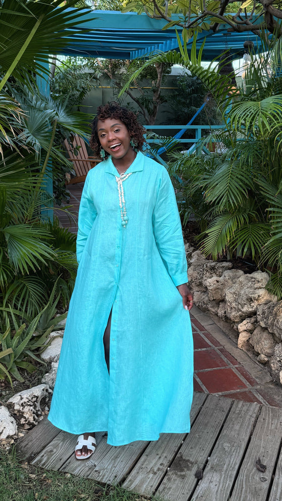 Long length 100% linen dress in turquoise blue. Bright blue linen dress with long sleeves for vacation and travel.